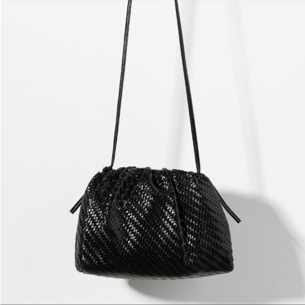 Anthropologie Frankie clutch size 10” by 7.5” by 3”